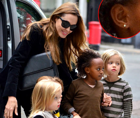 FOTO Angelina Jolie Shiloh in Zaharo peljala luknjati ušeska