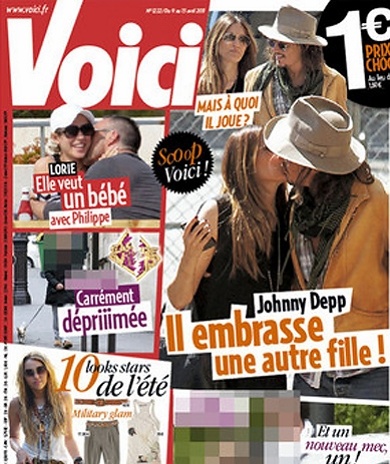 FOTO Johnny Depp ujet med poljubljanjem druge ženske