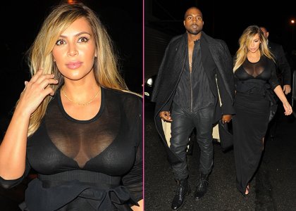 OJOJ! Kim Kardashian: Bujne prsi so ji skoraj padle iz obleke!