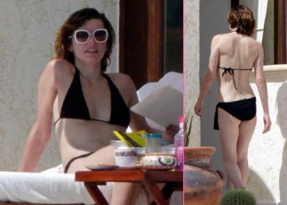 Seksi Milla Jovovich: V črnih bikinkah pokazala popolno telo