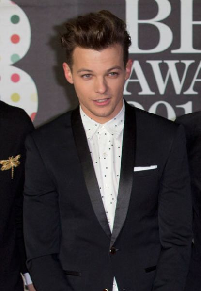 Louis iz One Direction: Mislil je, da ga bo oboževalec pretepel!