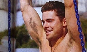 FOTO: Zac Efron pokazal svoje neverjetne sixpacke in nov tatu!